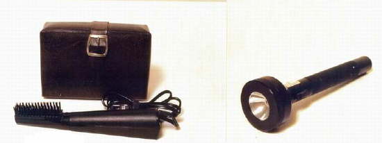 Elvis' personal electric hairbrush and comb and black flashlight with a metal detector